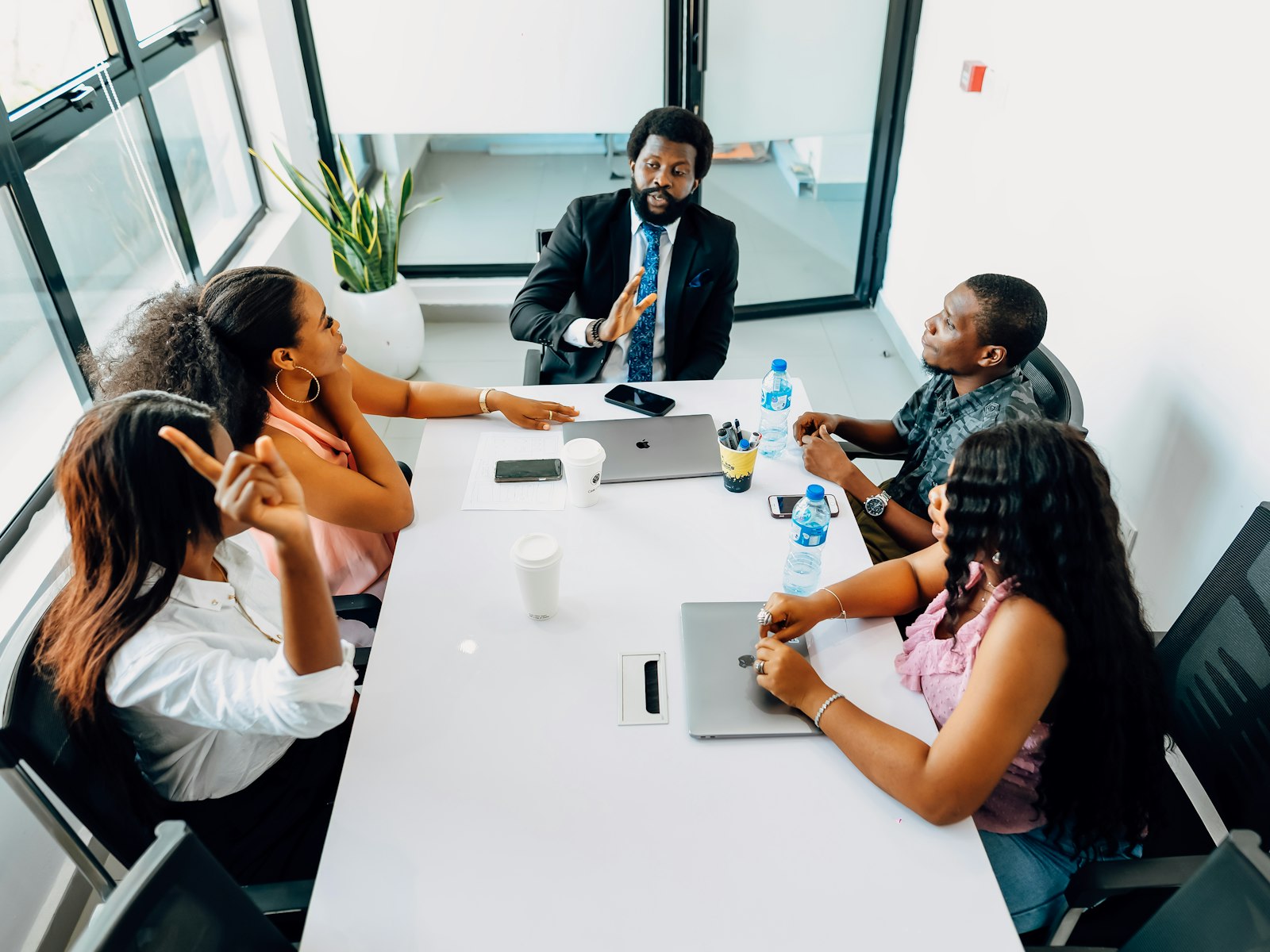 A small team working together around one table